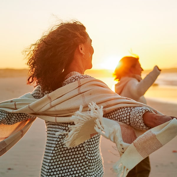 Woman walking on the beach