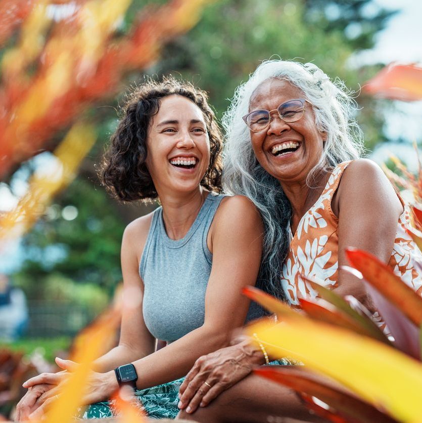 Pacific Islander woman and adult daughter spending time together