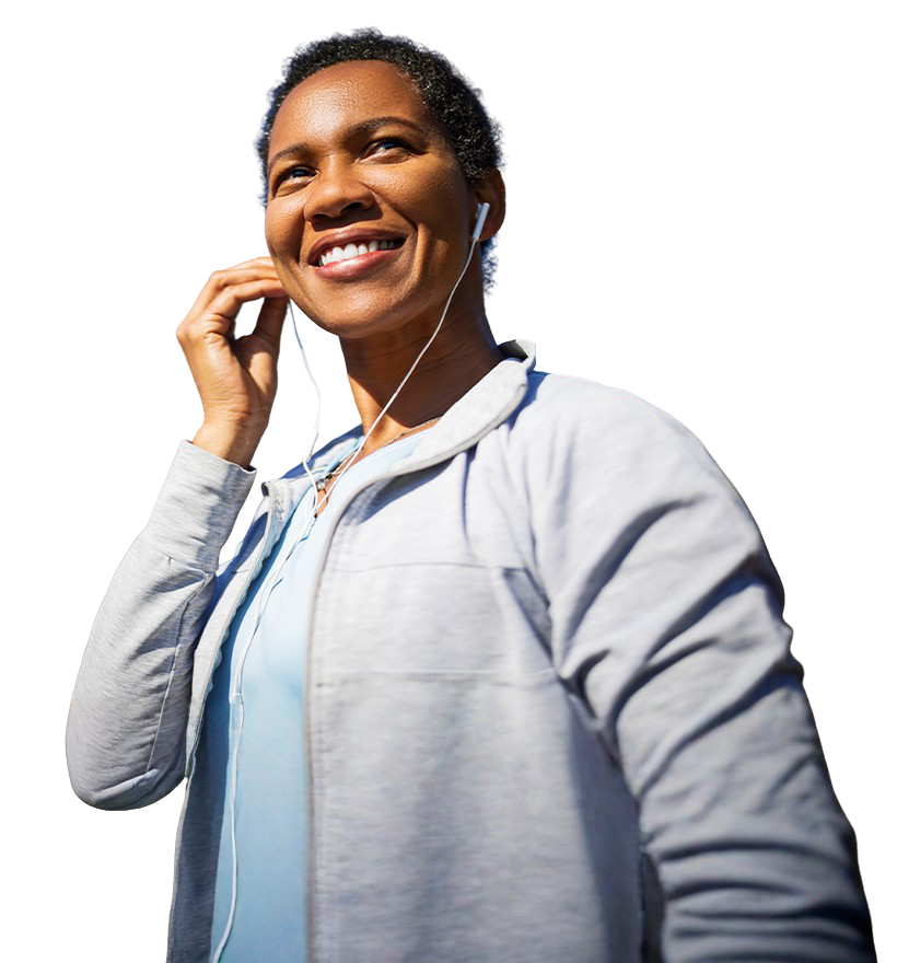 Smiling woman walking for exercise